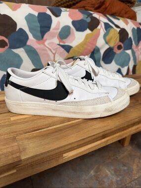 Women’s Nike White Low-Top Sneakers with Black Swoosh